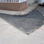 Reparación bache en calle.
